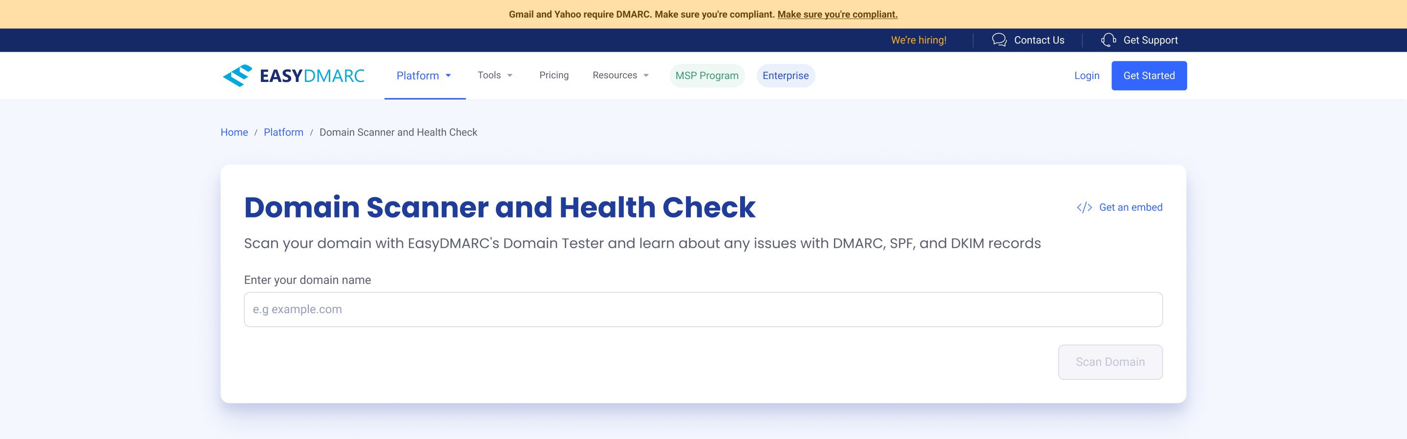 Domain Scanner default state — the 'Domain Scanner and Health Check' module at the top of the public page, with a single 'Enter your domain name' field, a disabled Scan Domain button, and a 'Get an embed' link in the top-right corner.
